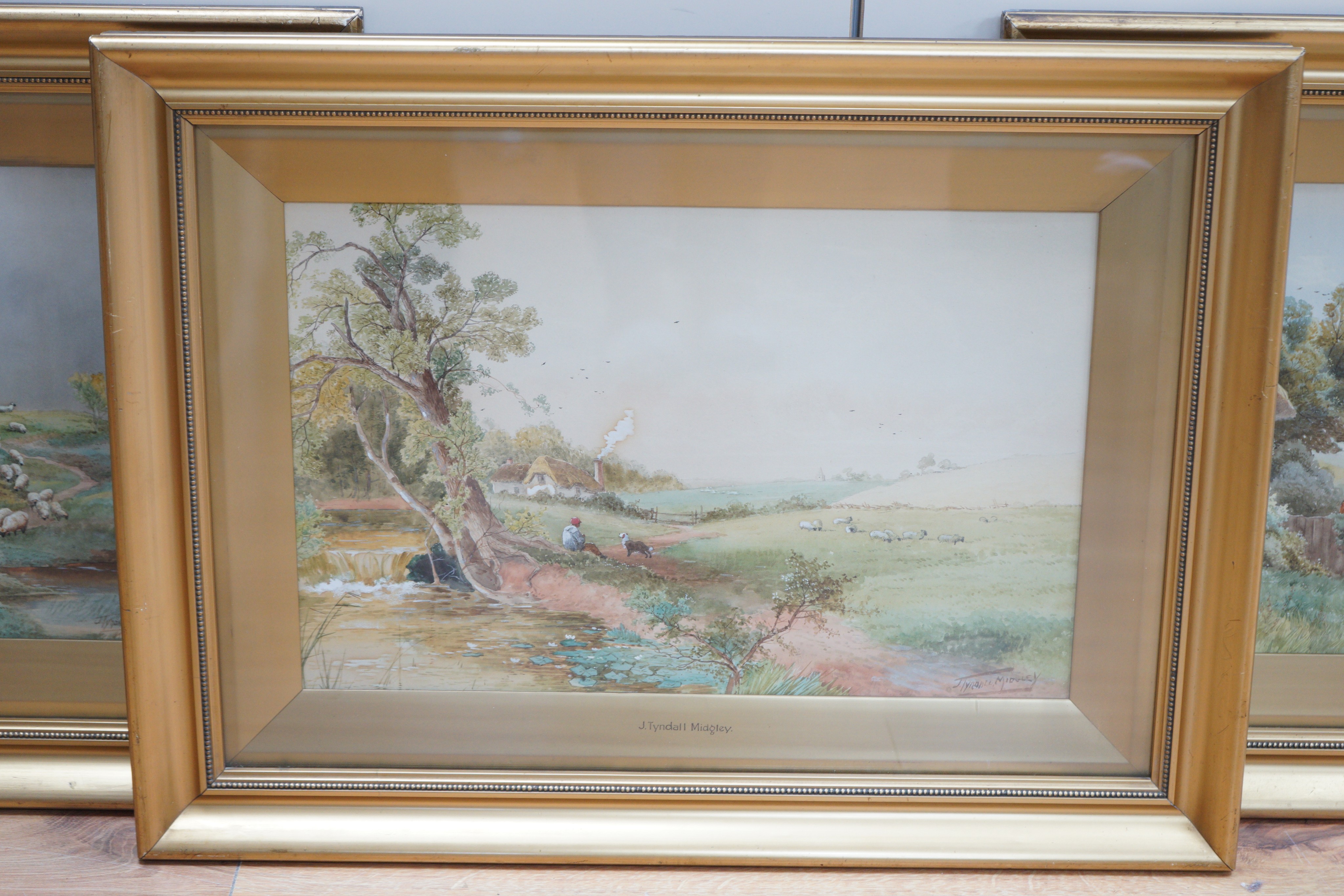 James Tyndall Midgley (1872-1962), three watercolours, Rustic scenes, signed, 28 x 43cm